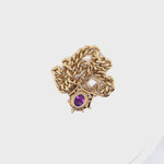 Yellow Gold Curb Link Bracelet with Amethyst Filigree Padlock