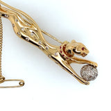 Yellow and White Gold Diamond and Ruby set Jaguar Brooch.