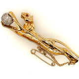 Yellow and White Gold Diamond and Ruby set Jaguar Brooch.