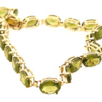 14ct Yellow Gold & 18 Stone Peridot Bracelet
