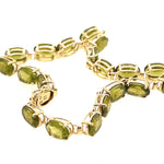 14ct Yellow Gold & 18 Stone Peridot Bracelet