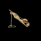 Yellow and White Gold Diamond and Ruby set Jaguar Brooch.