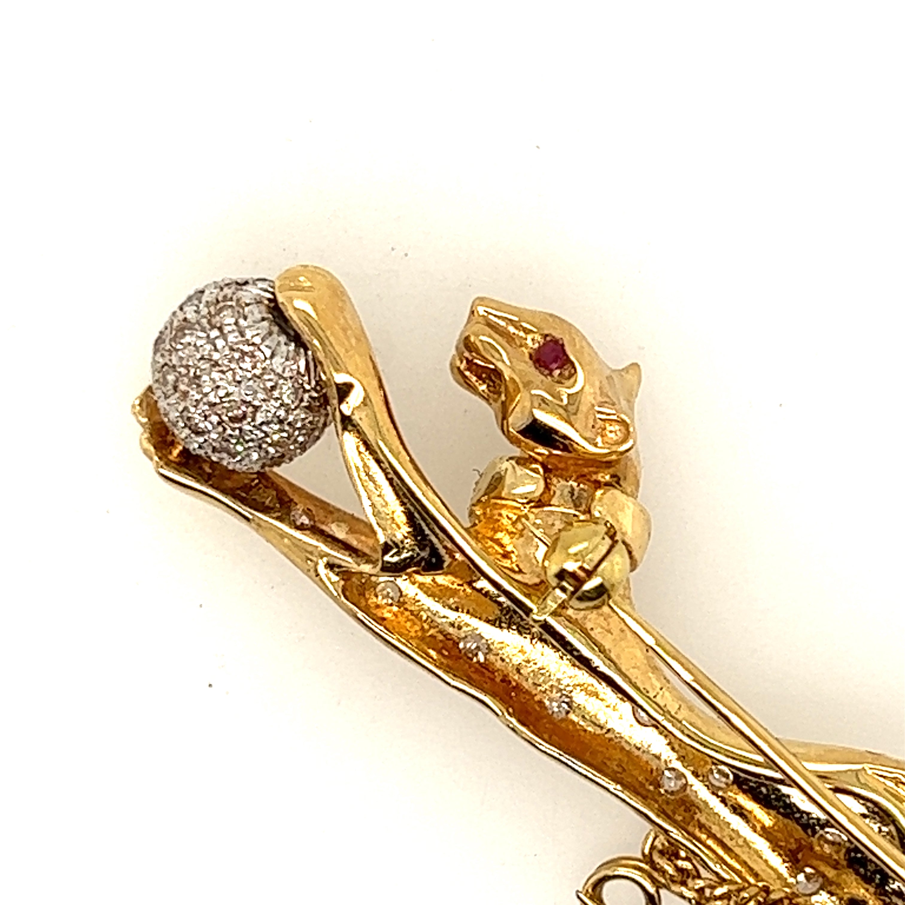 Yellow and White Gold Diamond and Ruby set Jaguar Brooch.