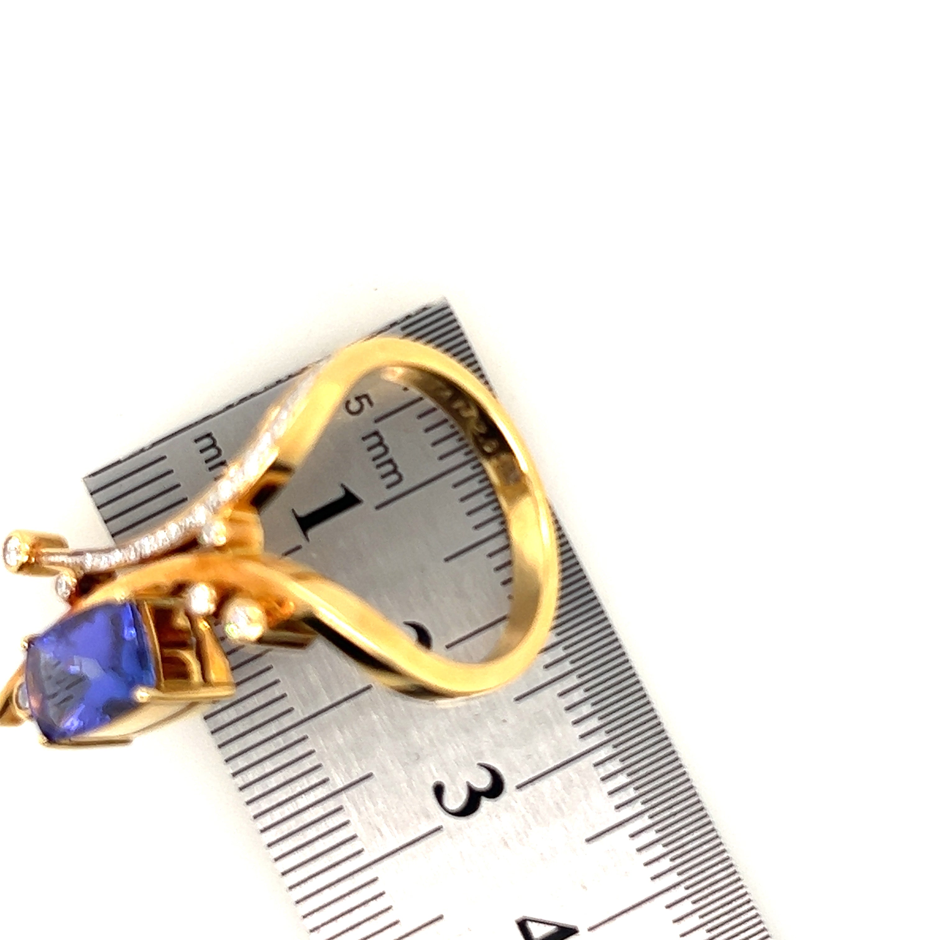Tanzanite and Diamond Ring set in 18ct Yellow Gold