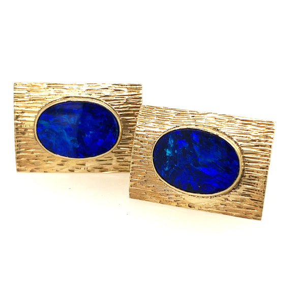 Opal cuff links set in 9ct yellow gold.