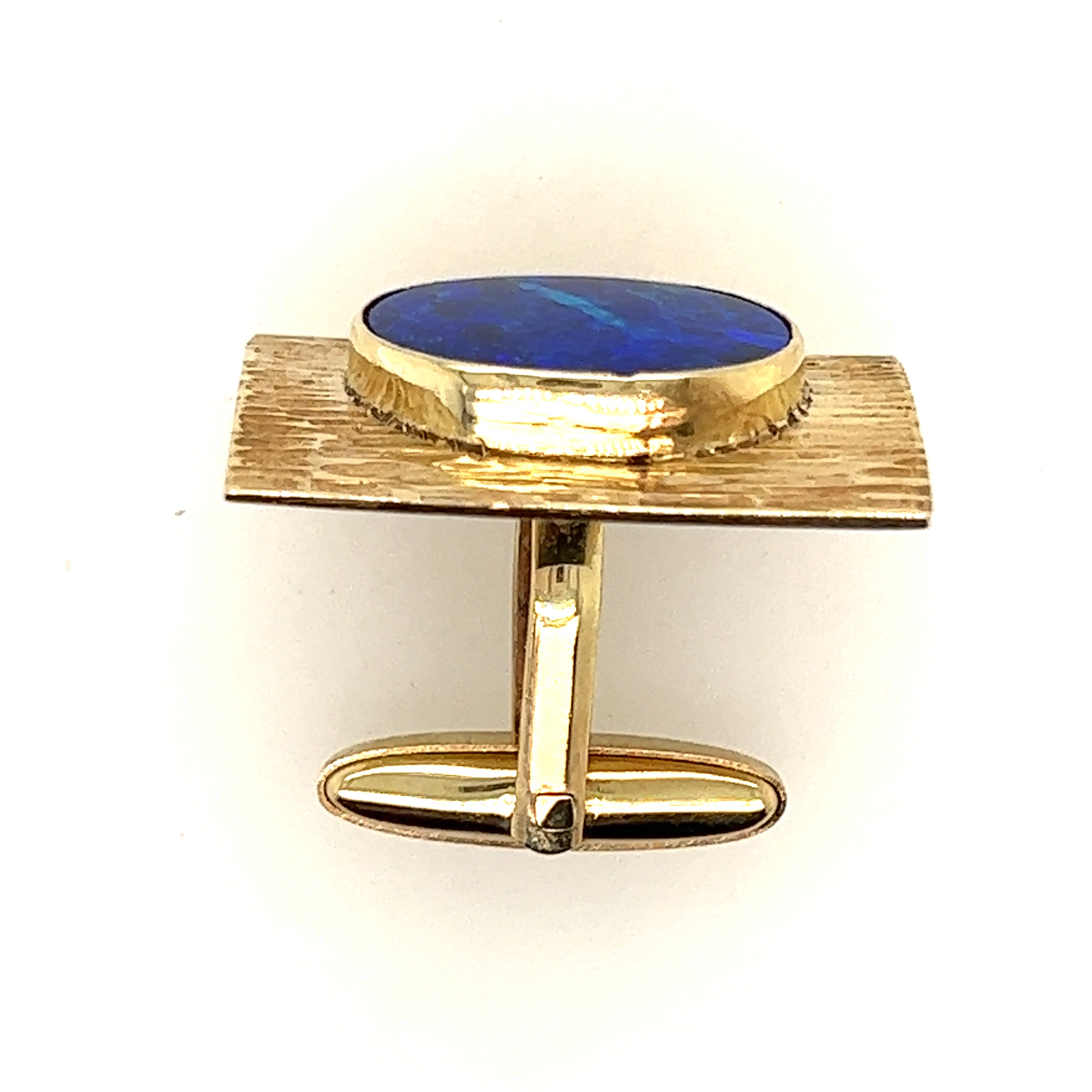 Opal cuff links set in 9ct yellow gold.